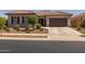 Charming single-story home featuring a well-manicured front yard, inviting curb appeal at 2750 W Pollack St, Phoenix, AZ 85041