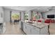 Bright kitchen island that seamlessly flows into the living and dining areas at 2750 W Pollack St, Phoenix, AZ 85041