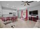 Bright open floor plan with modern kitchen, tile floors and bright red accents at 2750 W Pollack St, Phoenix, AZ 85041