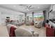 Spacious living room featuring tile floors, bright windows, and comfortable seating at 2750 W Pollack St, Phoenix, AZ 85041