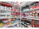 Organized pantry shelves hold various food items and appliances for convenient storage at 2750 W Pollack St, Phoenix, AZ 85041