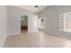 Spacious bedroom features tile floors, plantation shutters, and an ensuite bathroom for added privacy at 3050 E Pontiac Dr, Phoenix, AZ 85050