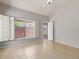 Bright bedroom features tile flooring, shuttered windows, and ceiling fan at 3050 E Pontiac Dr, Phoenix, AZ 85050