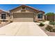 Front exterior of the home with a two car garage at 3050 E Pontiac Dr, Phoenix, AZ 85050