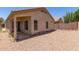 Back exterior view of home with patio and low-maintenance yard at 3050 E Pontiac Dr, Phoenix, AZ 85050