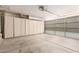Spacious two car garage with cabinets and opener at 3050 E Pontiac Dr, Phoenix, AZ 85050