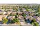An aerial view of a residential neighborhood with green trees and well-maintained lawns at 3080 E Andre Ave, Gilbert, AZ 85298