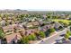 A lovely aerial view shows a peaceful neighborhood dotted with mature shade trees at 3080 E Andre Ave, Gilbert, AZ 85298