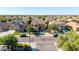 Neighborhood aerial view of this home with desert landscaping, front lawn, and tile roof at 3080 E Andre Ave, Gilbert, AZ 85298