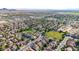 An aerial view features a well-planned community with green spaces and convenient access to roads at 3080 E Andre Ave, Gilbert, AZ 85298