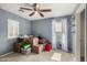 Bedroom with carpet and a window and full of belongings in moving boxes at 3080 E Andre Ave, Gilbert, AZ 85298