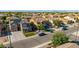 Inviting two-story home with solar panels, an attached garage, and manicured front yard at 3080 E Andre Ave, Gilbert, AZ 85298