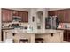 Beautiful kitchen featuring a large island, stainless steel appliances, and ample counter space at 3080 E Andre Ave, Gilbert, AZ 85298