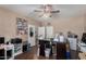 This office includes a ceiling fan, wood floors, and access to additional rooms via white double doors at 3080 E Andre Ave, Gilbert, AZ 85298