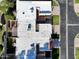Overhead view of a residential rooftop, including a backyard patio and surrounding neighborhood at 3345 E University Dr # 2, Mesa, AZ 85213