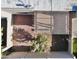Aerial view of a private backyard with a covered patio and desert landscaping at 3345 E University Dr # 2, Mesa, AZ 85213