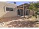 Backyard and enclosed patio with a covered lattice and a bench at 3345 E University Dr # 2, Mesa, AZ 85213