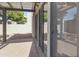 View of the backyard and enclosed patio with a covered lattice at 3345 E University Dr # 2, Mesa, AZ 85213