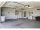 Well-organized garage featuring built-in cabinets, a laundry area, and plenty of storage at 3345 E University Dr # 2, Mesa, AZ 85213