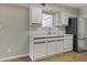 Kitchen with stainless steel appliances, ample counter space, and natural light at 3345 E University Dr # 2, Mesa, AZ 85213
