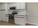Kitchen with stainless steel oven, stainless steel microwave, and hardwood floors at 3345 E University Dr # 2, Mesa, AZ 85213