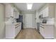 Traditional kitchen with stainless steel appliances and white cabinetry at 3345 E University Dr # 2, Mesa, AZ 85213