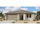 Charming single-story home with a two-car garage and low maintenance desert landscaping at 3348 E Valleyhigh Trl, San Tan Valley, AZ 85143