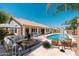 Inviting backyard with refreshing pool, stylish seating, and landscaping for outdoor enjoyment at 3550 E Topeka Dr, Phoenix, AZ 85050