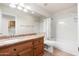 Bathroom with granite countertops, tile floors, and shower-tub combo at 3550 E Topeka Dr, Phoenix, AZ 85050