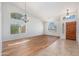 Bright and airy living room with high ceilings, clerestory windows, and a warm and inviting atmosphere at 3550 E Topeka Dr, Phoenix, AZ 85050