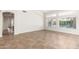 Inviting living room with natural light and views of the backyard pool at 3550 E Topeka Dr, Phoenix, AZ 85050