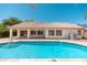 Sparkling pool with convenient patio access, perfect for cooling off and enjoying the outdoors at 3550 E Topeka Dr, Phoenix, AZ 85050