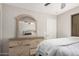 Bedroom with matching dresser and mirror plus a ceiling fan at 3625 W South Butte Rd, San Tan Valley, AZ 85144