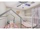 Charming bedroom with twin house frame beds and sweet decor, perfect for  at 3625 W South Butte Rd, San Tan Valley, AZ 85144