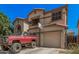 Two-story home with arched entry and basketball hoop over garage at 3625 W South Butte Rd, San Tan Valley, AZ 85144