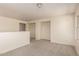 Open loft area featuring plush carpeting and neutral paint tones for a calming ambiance at 38191 W Merced St, Maricopa, AZ 85138