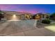 Charming home featuring desert landscaping, two car garage and wide driveway at 42105 N Golf Crest Rd, Anthem, AZ 85086