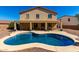 Backyard oasis featuring a refreshing pool and covered patio ideal for outdoor enjoyment and relaxation at 42616 W Avella Dr, Maricopa, AZ 85138