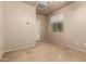 Neutral bedroom with carpet, ceiling fan, and good lighting, ready for personal touches at 42616 W Avella Dr, Maricopa, AZ 85138