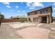 Spacious backyard featuring a patio area and ample space for outdoor activities at 45647 W Starlight Dr, Maricopa, AZ 85139