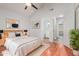 Cozy bedroom with ensuite bathroom access and high ceilings at 4601 N 102Nd Ave # 1020, Phoenix, AZ 85037