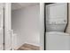 Functional laundry area with a stacked washer and dryer for easy use at 4601 N 102Nd Ave # 1020, Phoenix, AZ 85037