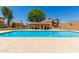 Community swimming pool with cabana, barbecue, and tanning area at 4601 N 102Nd Ave # 1020, Phoenix, AZ 85037