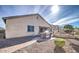 Spacious backyard with a built-in grill, trampoline, and manicured shrubbery creates a perfect oasis at 5316 N 186Th Dr, Litchfield Park, AZ 85340