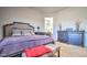 Well-furnished main bedroom with plush bedding and neutral colors at 5316 N 186Th Dr, Litchfield Park, AZ 85340