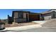 Charming single-story home featuring a brick-accented facade and a spacious two-car garage at 5650 S 253Rd Ave, Buckeye, AZ 85326