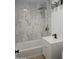 This bathroom features modern finishes and tile walls at 6216 S 5Th Ave, Phoenix, AZ 85041