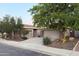 Charming single-Gathering home with a three-car garage and a mature shade tree at 645 W Longhorn Dr, Chandler, AZ 85286
