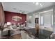 Open-concept living and dining area with a sleek marble table and plush seating at 645 W Longhorn Dr, Chandler, AZ 85286
