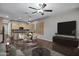 Combined living and dining area featuring modern decor, sleek flooring, and plenty of natural light at 645 W Longhorn Dr, Chandler, AZ 85286